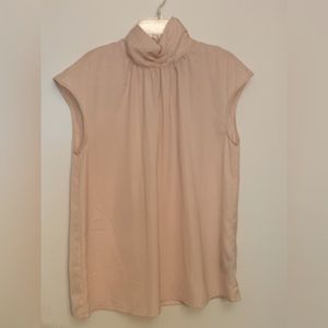 Sleeveless pink blouse